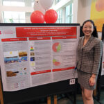 Vi-an and poster, Aresty